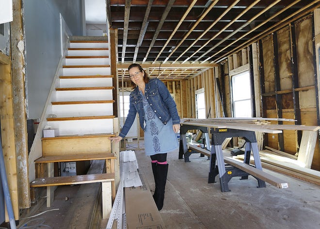 Lori Wright in her home which she has owned for 23 years. One year after the flooding she has still not moved back in. Lori showing how high the water was in her living room.

The Post Island neighborhood of Quincy one year after flood water damaged dozens of homes on Wednesday, March 13, 2019 Greg Derr/The Patriot Ledger