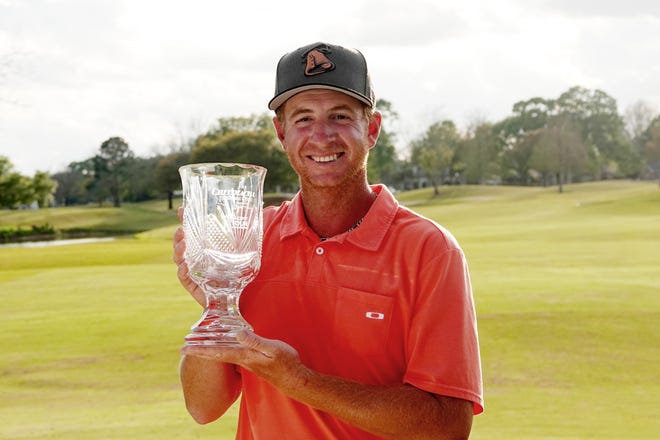Vince Covello holds the trophy for winning the Web.com Chitimacha Louisiana Open last week in Broussard, La. [PGA Tour]