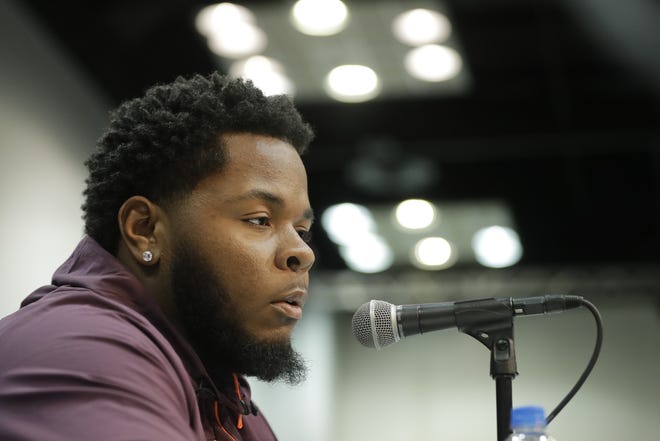 Florida offensive lineman Jawaan Taylor speaks to reporters at the NFL scouting combine on Feb. 28. Taylor participated in UF's pro day on Wednesday. [Darron Cummings/The Associated Press]