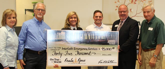 From left, during a presentation of proceeds from the Ocala Open, are Lynette Vermillion, Kenneth Colen, Karla Grimsley, Matt Hibbs, Nick Nikkinen and Vern Shukoski. [Photo courtesy On Top of the World]