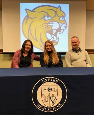 Exeter High School senior Izzy Day, center, with her parents, Kelly and Rob. Day recently became Exeter's first four-year girls hockey player to find a college home. Day will be a goaltender for the Johnson & Wales women next season. [Ryan O'Leary/Seacoastonline]