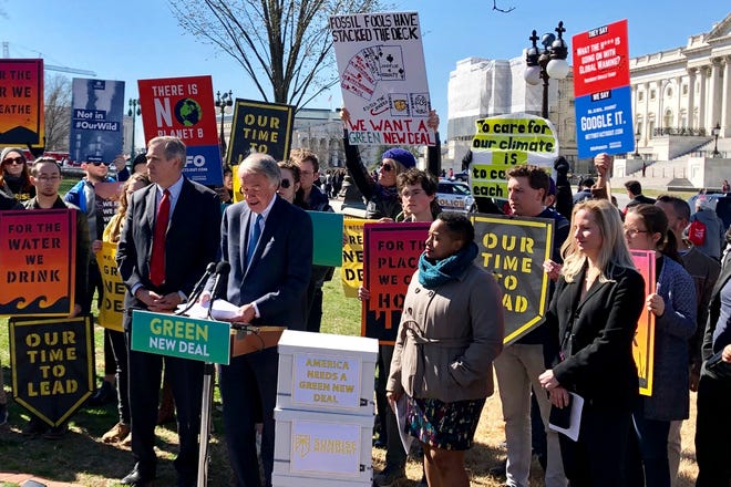 Sen. Edward Markey, D- Mass., speaks at a rally for Green New Deal, Tuesday, March 26, 2019, outside the Capitol in Washington. The Green New Deal calls for the U.S. to shift away from fossil fuels such as oil and coal and replace them with renewable sources such as wind and solar power. (AP Photo/Matthew Daly)