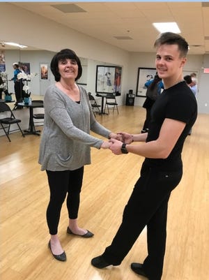 Middlesex District Attorney Marian Ryan takes a lesson with Belmont's Fred Astaire Dance Studio instructor Vlad Krupski in preparation for the upcoming fundraiser to benefit the Belmont Woman's Club on April 5. [Courtesy Photo]