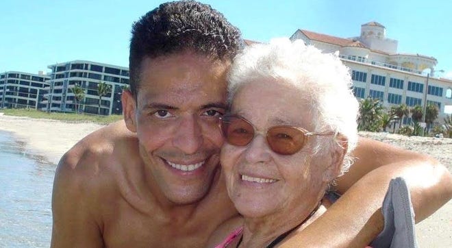 Mark Parrilla and his granmother, Leocadia Fonseca, who died in 2013 at age 88. [CONTRIBUTED]
