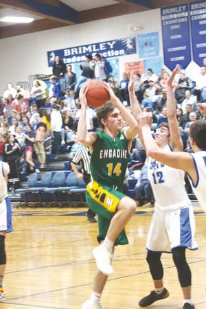 Andrew Blanchard (14) of Engadine competes against Brimley in a game this past season. Blanchard, the Eagles all-time scoring leader, was named the Upper Peninsula's Division 4 Player of the Year.