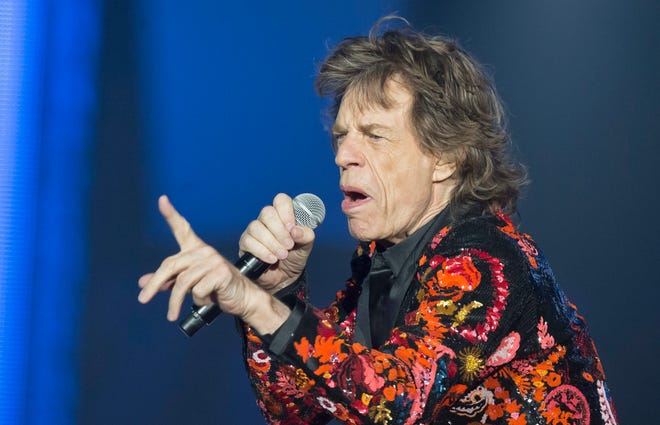 Mick Jagger of the Rolling Stones performs during the concert of their 'No Filter' Europe Tour 2017 at U Arena in Nanterre, outside Paris, France. The Rolling Stones are postponing their latest tour so Jagger can receive medical treatment. The band announced Saturday, March 30, 2019 that Jagger “has been advised by doctors that he cannot go on tour at this time.” The band added that Jagger “is expected to make a complete recovery so that he can get back on stage as soon as possible.” (AP Photo/Michel Euler, File)