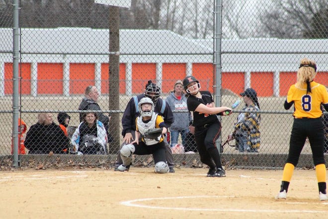 Lainey Kelly (20) hits her first home run against Sherrard pitcher Kaitlyn Woods on Friday in Kewanee's 10-7 softball victory at Northeast Park.