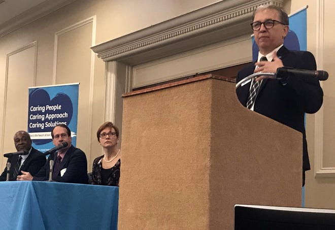 From left, Keith Williamson of Fitchburg State University, Jeff Fuhrer of the Federal Reserve Bank of Boston and Cheryl Molebash of Dixie Consumer Products sit on a panel moderated by Ed Manzi of Fidelity Bank at the 2019 Economic Forecast Breakfast on Friday in Leominster. [T&G Photo/Cyrus Moulton]