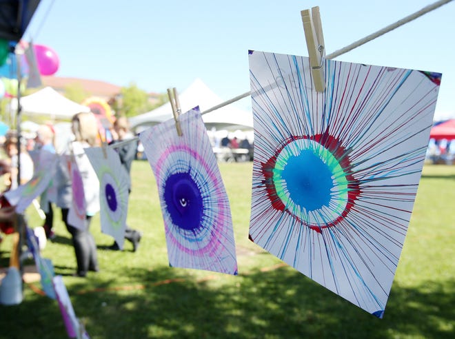 Pieces of "Spin Art" hang to dry at the 8th annual Druid City Arts Festival held at Government Plaza in Tuscaloosa on April 8, 2017. [File Staff Photo/Erin Nelson]