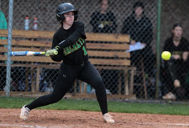 Bessemer City's Brianna Beaty swings the bat as Bessemer City High School hosted Cherryville High in the rain Monday aftenoon, March 25, 2019. [Mike Hensdill/The Gaston Gazette]