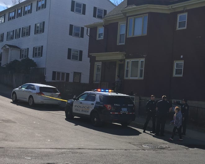 Police taped off a portion of Pearce Street, near North Main Street, in Fall River Monday morning following a reported stabbing that left a man in serious condition. [Herald News photo by Jo C. Goode]
