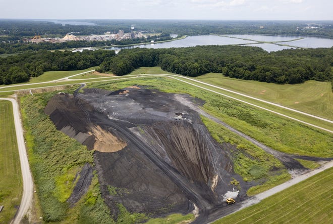 This is an aerial view of a coal ash site near the KapStone Paper and Packing Corp. plant along the Roanoke River in Roanoke Rapids. [Steve Helber/The Associated Press, file]