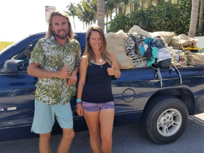 Bryan Galvin and Heather Bolint of Plastic Symptoms with a few days haul of trash from the Palm Beach County coastline.