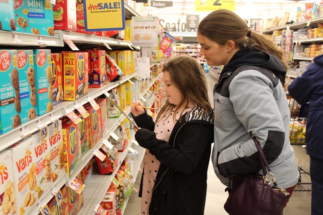 Colonial Heights Public Schools' students in kindergarten through second grade participate in the school division's annual Family Math Night at the Food Lion in Dunlop Village Shopping Center on March 6. [Kelsey Reichenberg/Colonial Heights Public Schools]