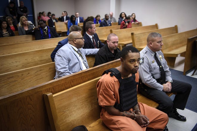 Michael Ray McLellan, 34, sits in court for his first appearance fon charges of kidnapping and murder of 13-year-old Hania Noelia Aguilar on Monday, Dec. 10, 2018, in Lumberton, N.C. [Andrew Craft/The Fayetteville Observer via AP]