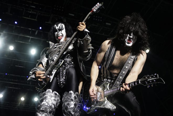 Gene Simmons, left, and Paul Stanley, of the rock band Kiss, perform during a concert at a rock festival in Bogota, Colombia. The iconic rock band is on what it says is its farewell tour, which stopped Friday at the Wells Fargo Center in Philadelphia. [AP FILE PHOTO]