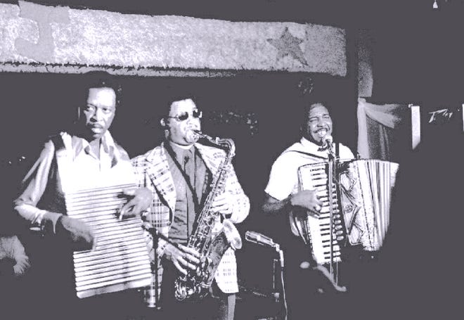 Chenier (right) performs on the Blues Accordion.