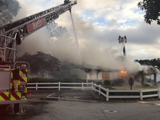 Crews were battling a large fire Tuesday night at the vacant Glen Apartments on South College Road. [COURTESY WILMINGTON POLICE DEPARTMENT]