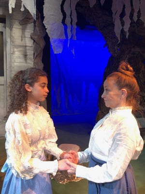Carryl Lynn, right, as Granny Foster and Olivia Thompson as Winnie in "Tuck Everlasting" at the Cape Cod Theatre Company/Harwich Junior Theatre. COURTESY OF CAPE COD THEATRE COMPANY/HARWICH JUNIOR THEATRE