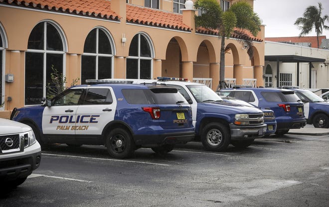 Police vehicles parked behind the Palm Beach Police Department located at 345 S. County Road on March 20, 2019. [Damon Higgins/palmbeachdailynews.com]