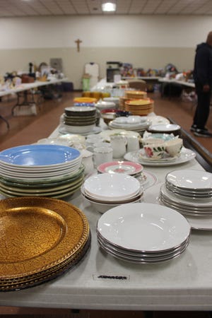 China on display at Saint James Catholic Church in Gadsden. These items, along with other glassware, electronics, clothing, furniture and more will be on sale Saturday April 6 during the annual rummage sale hosted to benefit the Saint James Catholic School. [Dustin Fox/Gadsden Times]