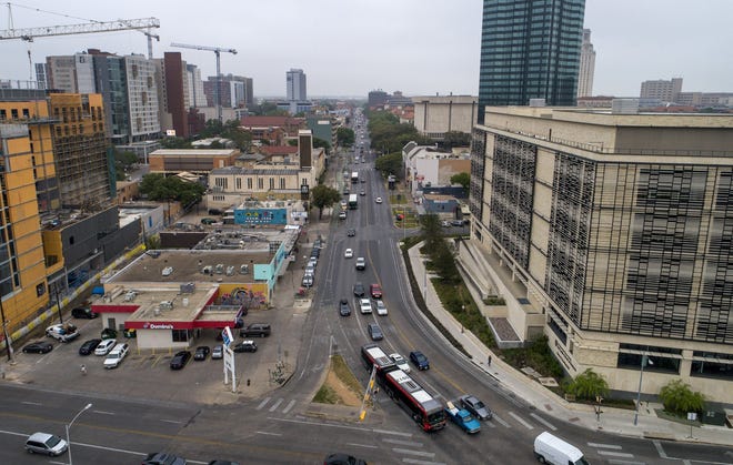 On Friday, drivers travel on Guadalupe Street at the Drag near the University of Texas, which could be part of Capital Metro's proposed new mass transit route known as the Orange Line. [JAY JANNER/AMERICAN-STATESMAN]