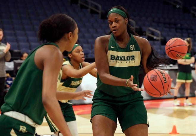 Baylor uses its size, including 6-foot-7 center Kalani Brown (21), at both ends of the floor. (Associated Press/Chris O'Meara)