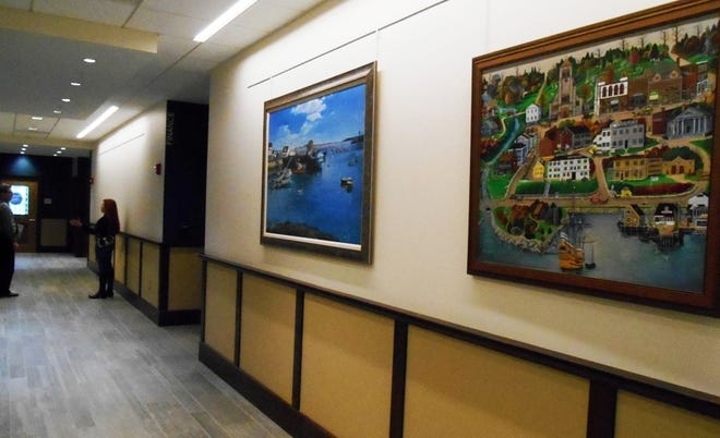 Two paintings outside the planning office are the only art work on display at Town Hall in Plymouth. A request for artwork from members of the public will add more art to the walls. (Robin Carver)