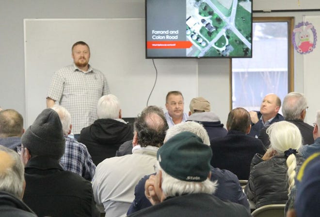 Garrett Myland, assistant managing director, at St. Joseph County Road Commission, addresses a full house during a public hearing Thursday regarding a roundabout at Farrand and Colon roads.