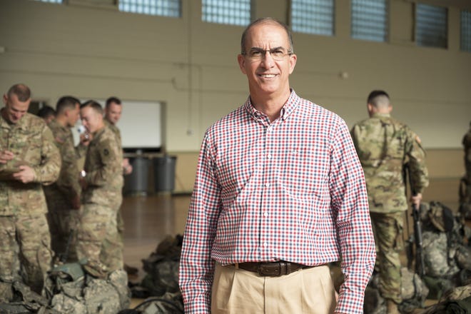 "The citizen-soldier tradition goes back to militia days when our nation was founded," says Carey Baker, seen here at the National Guard Armory in Eustis. "You are on call, ready to saddle up." [Cindy Sharp/Correspondent]