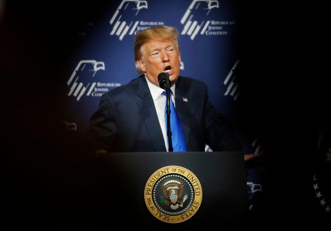 President Donald Trump speaks at an annual meeting of the Republican Jewish Coalition on Saturday in Las Vegas.