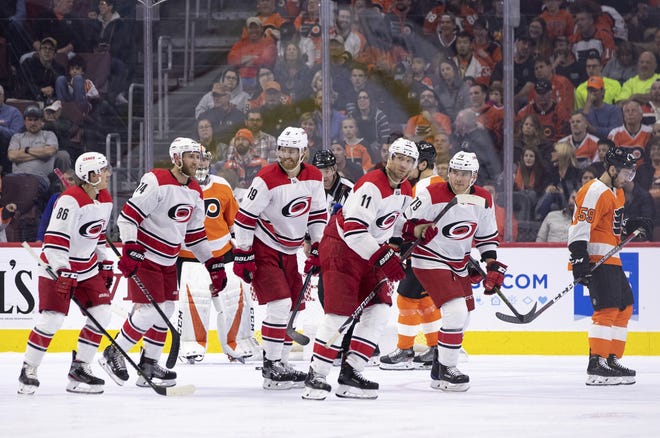 Carolina Hurricanes' Jordan Staal (11) celebrates his goal with teammates in Philly. The Canes will face Washington in the playoffs. [AP Photo/Chris Szagola]