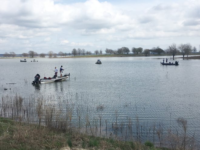 Several Kansas State fishing teams fish in a cove near the launch ramp Sunday at Perry Reservoir during the 2019 Kansas BASS Nation College State Championship. [Josh Rouse/The Capital-Journal]