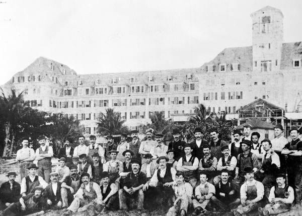 The plumbers and mechanics who helped build Henry Flagler's Royal Poinciana Hotel in Palm Beach pose before the nearly finished project in 1893. Flagler, for whom the county would later be named, was among the wealthiest men in the country when he built the hotel for $1 million. [State Archives of Florida]