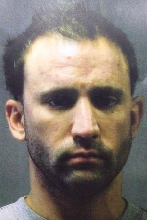 Attorney Michael Moscaritolo, 32, was arrested in Quincy on Friday, Oct. 9, 2015. Plymouth District Attorney's office photo