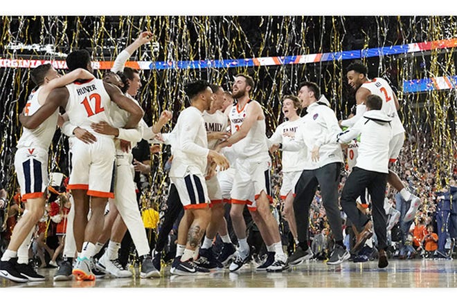NATIONAL CHAMPIONS — Virginia celebrates its first national championship after beating Texas Tech in overtime.
