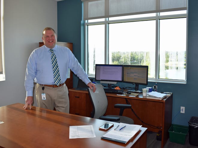 Palm Coast City Manager Matthew Morton at his desk on Monday, his first day with the city. [Photo provided]