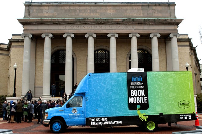 The new Framingham Public Library Bookmobile was unveiled Tuesday morning at the Memorial Building. [Daily News and Wicked Local Staff Photo/Art Illman]