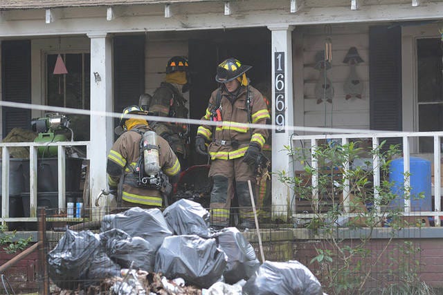 AFTER THE FIRE — Eastside, Westside and Seagrove Fire Departments responded to a house fire in Randleman Tuesday afternoon. (Scott Pelkey / The Courier-Tribune)