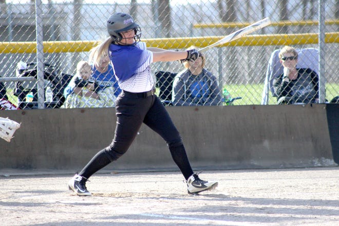 Cambridge's Miranda Hill (3) takes a swing at the ball, hitting a single during their game against Zanesville on Wednesday.