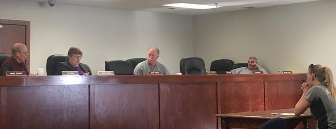 The Ionia County Board of Commissioners' personnel committee and Director of Animal Care and Control Carly Quinn (right) discuss a potential change to the county's animal control ordinance on March 26, 2019. [MITCHELL BOATMAN/SENTINEL-STANDARD]