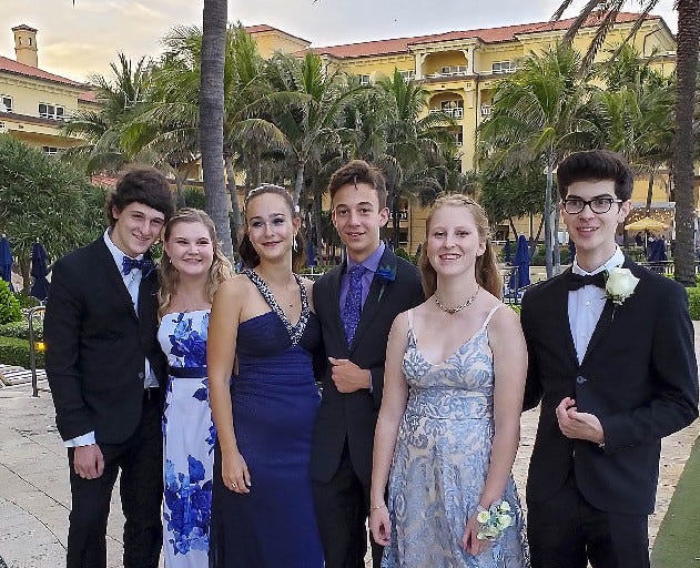 Park Vista students, from left, Connor Marcellus and Megan Galloway, Connor Edmonds and Felicia Cantagallo and Walter Braithwaite and Lilly Marcellus, pose for photos Saturday at Eau Palm Beach Resort and Spa in Manalapan. The student were at the hotel for a fancy dinner to make up for not being able to attend the senior prom at Park Vista High School when the staff at the hotel stepped in and provided the youngsters with an impromptu prom. (Photo provided by Braithwaite family)