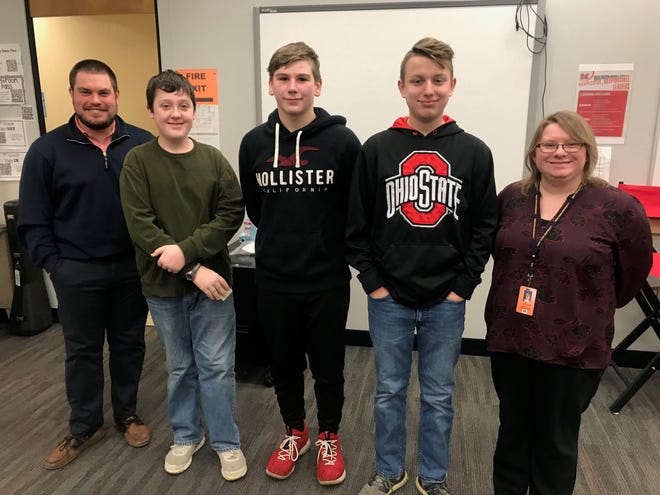Teacher judges Mr. Morrison and Ms. Edwards are pictured with students Isaac Majoris, Austin Callahan and Aiden Keller. The students invented a container that helps to keep track of when food is about to expire.
