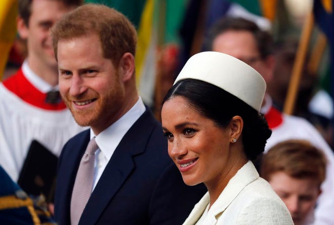 In this Monday, March 11, 2019 file photo, Britain's Prince Harry and Meghan, the Duchess of Sussex leave after the Commonwealth Service at Westminster Abbey in London. Guinness World Records said Wednesday, April 3 that a new Instagram account opened by Prince Harry and his wife Meghan is the fastest-ever to gain 1 million followers. The account, which was opened Tuesday, reached the 1 million mark in under six hours, easily beating a record held by Korean pop sensation Kang Daniel.