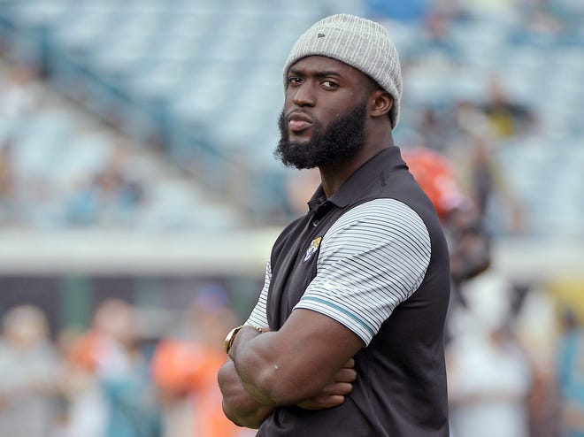 Jacksonville Jaguars running back Leonard Fournette watches players warm up before a game Nov. 5, 2017 in Jacksonville, Fla. Fournette was arrested Thursday for driving with a suspended license and released a short time later. Fournette paid a $1,508 bond and was freed after spending less than 30 minutes in the Duval County Jail, according to jail records. [PHELAN M. EBENHACK/AP FILE PHOTO]