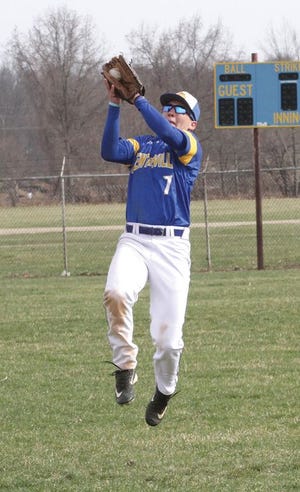 Trae Martin of Centreville makes a leaping catch for an out against Quincy on Thursday afternoon.