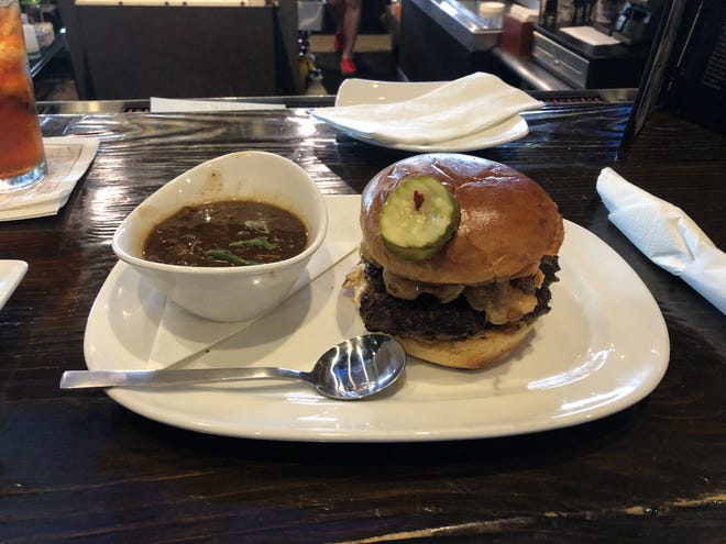The Surf and Turf burger and duck and andouille gumbo from Walk-On's Bistreaux and Bar. [Scott Yoshonis/Staff -- houmatoday/dailycomet]