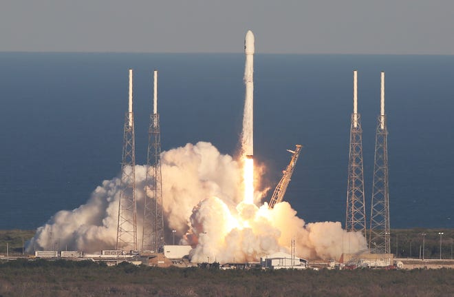 A SpaceX Falcon 9 rocket carrying a TESS spacecraft lifts off on April 18, 2018, from Space Launch Complex 40 at Cape Canaveral Air Force Station in Florida. TESS is a telescope/camera that will hunt for undiscovered worlds around nearby stars. (Red Huber/Orlando Sentinel/TNS)
