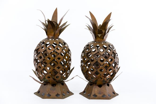 Fruit colors or fruit-inspired decor such as pineapple lanterns can add some fun to your rooms. [CAPEHART]