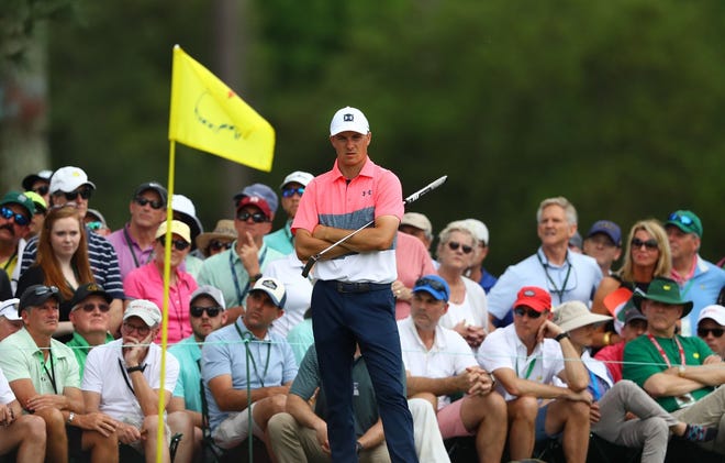 Jordan Spieth, waiting to putt on the seventh green Friday, has gone 4 over par on the front nine and 8 under on the back side at the Masters. [Curtis Compton/Atlanta Journal-Constitution]